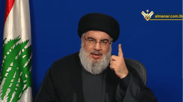 Nasrallah’s warning – in front of a Lebanese flag, not Hizbullah’s. (Arab press)