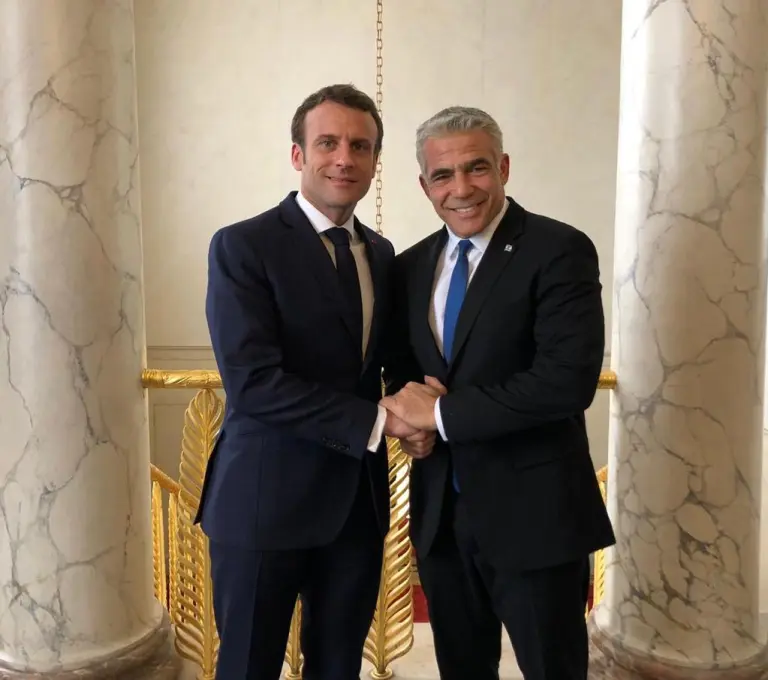 Israel’s Foreign Minister Yair Lapid with French President Macron (Facebook)
